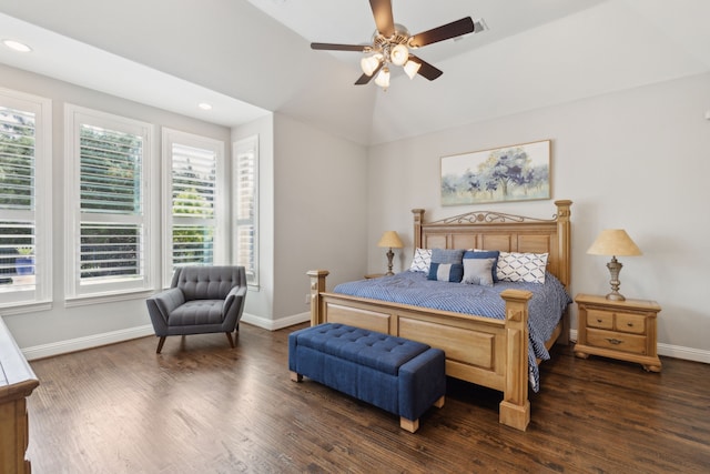 bedroom with recessed lighting, wood finished floors, and baseboards