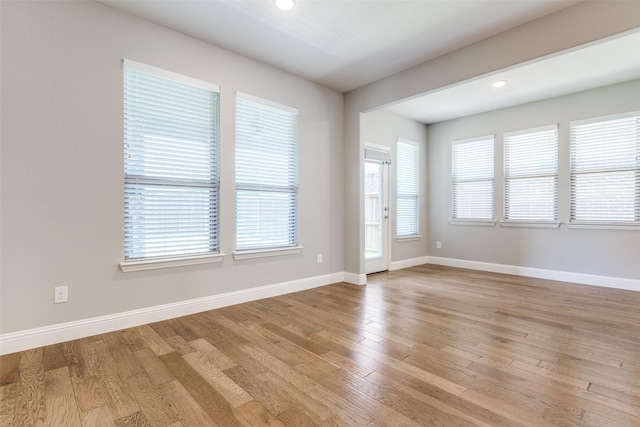 1624 Sweetwater Way, Celina, TX 75009 - unfurnished room with light wood finished floors, plenty of natural light, and recessed lighting
