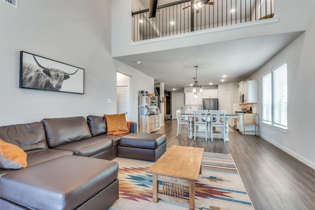 4737 Tanglewood Dr, Haltom City, TX 76137 - living room with visible vents, baseboards, a high ceiling, recessed lighting, and dark wood-type flooring