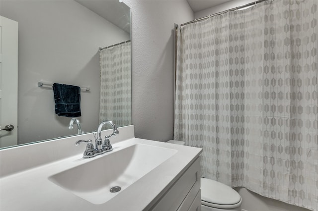 4737 Tanglewood Dr, Haltom City, TX 76137 - bathroom featuring toilet, a shower with shower curtain, and vanity