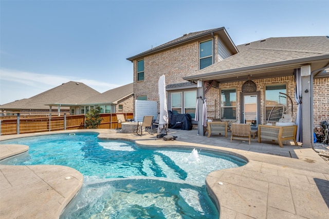 4737 Tanglewood Dr, Haltom City, TX 76137 - view of swimming pool featuring a patio, a pool with connected hot tub, and fence