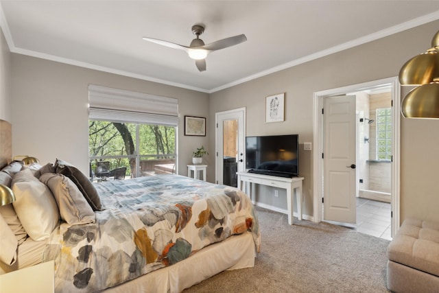tiled bedroom with ornamental molding, carpet floors, baseboards, and access to exterior