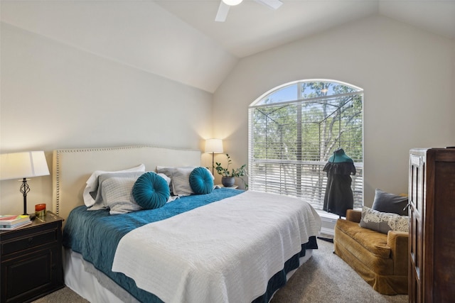 carpeted bedroom featuring ceiling fan and lofted ceiling