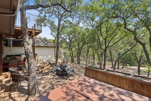 deck featuring a ceiling fan