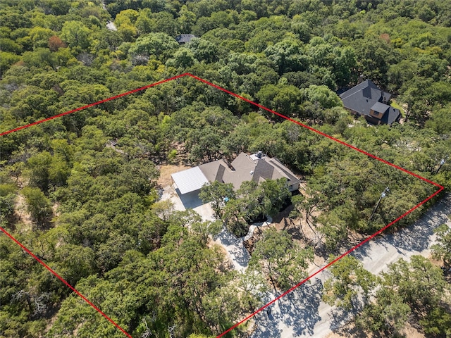 bird's eye view with a forest view