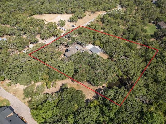 aerial view with a wooded view