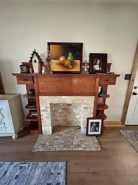 239 Ranch Rd, Joshua, TX 76058 - detailed view of wood finished floors and baseboards