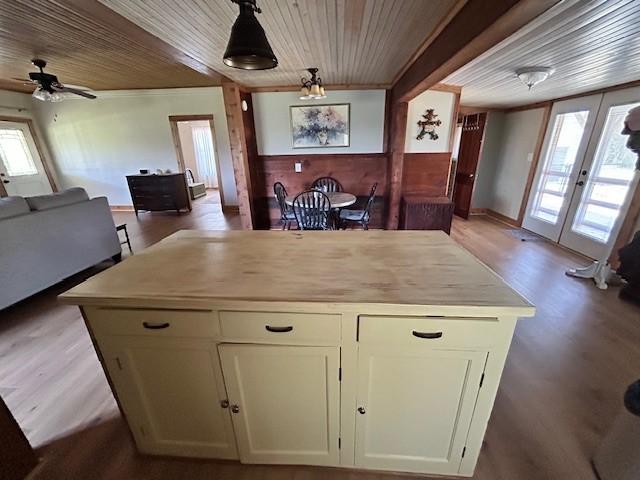 239 Ranch Rd, Joshua, TX 76058 - kitchen featuring wood ceiling, open floor plan, french doors, plenty of natural light, and wood finished floors