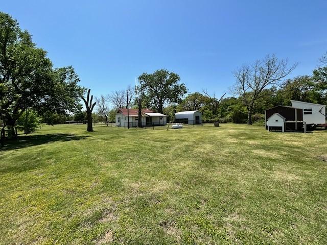 239 Ranch Rd, Joshua, TX 76058 - view of grassy yard featuring an outdoor structure