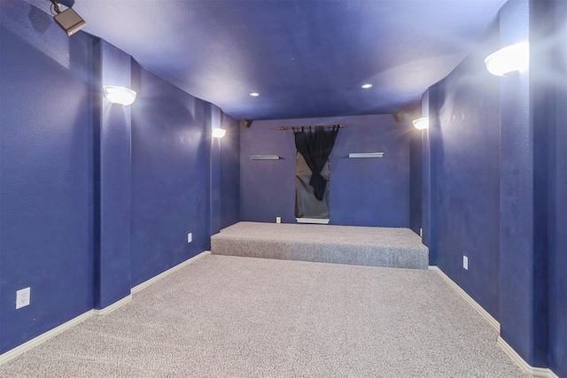cinema featuring baseboards, recessed lighting, and carpet