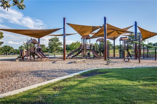 community playground with a lawn