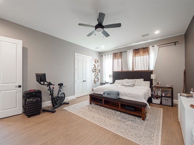 1515 Malone Dr, Royse City, TX 75189 - bedroom with a closet, baseboards, a ceiling fan, visible vents, and light wood finished floors