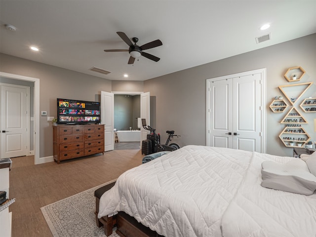 1515 Malone Dr, Royse City, TX 75189 - bedroom with recessed lighting, visible vents, a closet, and wood finished floors