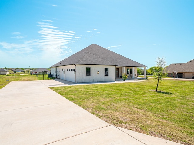 1515 Malone Dr, Royse City, TX 75189 - view of front of home featuring concrete driveway, a front yard, a garage, and a shingled roof