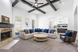 living room with carpet, a fireplace, beamed ceiling, recessed lighting, and coffered ceiling