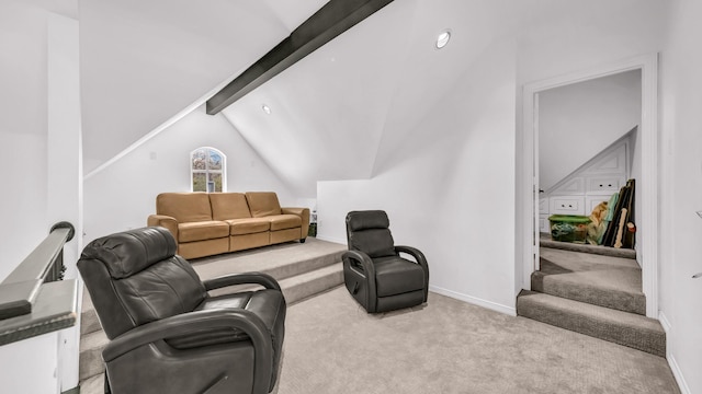 living area featuring lofted ceiling with beams, baseboards, and carpet floors