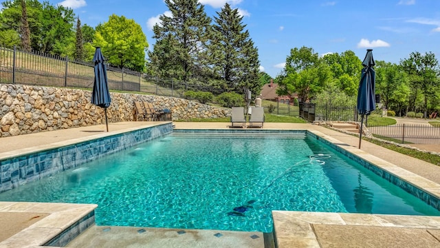 view of pool featuring a fenced in pool and fence