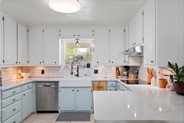 kitchen with backsplash, white cabinets, under cabinet range hood, dishwasher, and a sink