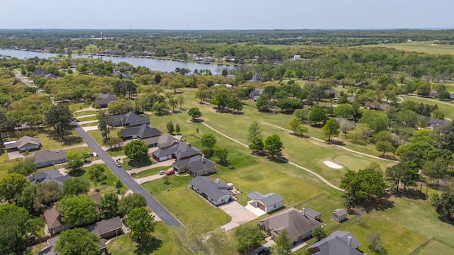bird's eye view with a water view and a residential view