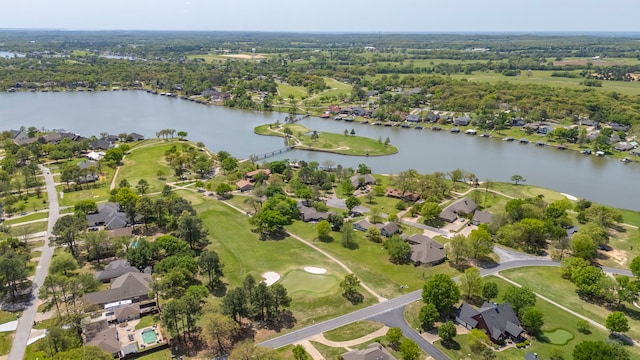 aerial view with a water view and a residential view
