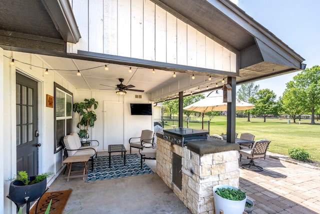 view of patio / terrace with a ceiling fan and area for grilling