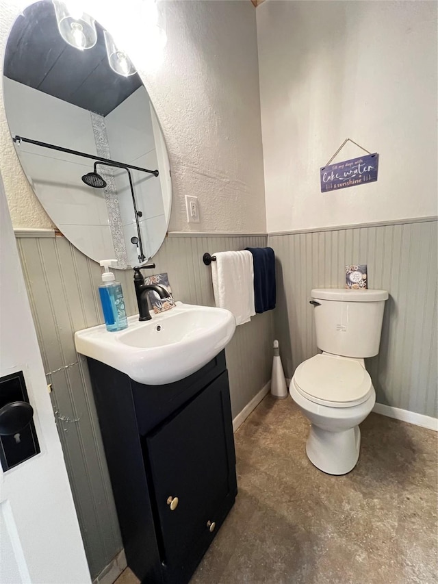 143 Lisa Layne St, Gun Barrel City, TX 75156 - bathroom featuring a wainscoted wall, vanity, a shower, and toilet