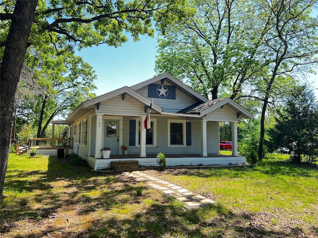 143 Lisa Layne St, Gun Barrel City, TX 75156 - view of front of property featuring a front lawn and covered porch