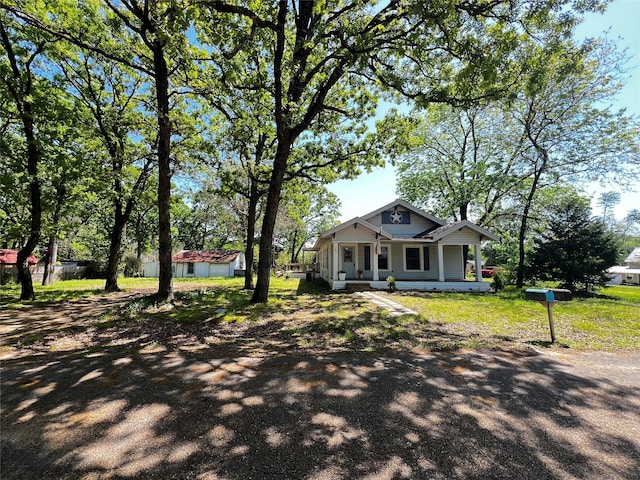 143 Lisa Layne St, Gun Barrel City, TX 75156 - bungalow-style house with covered porch