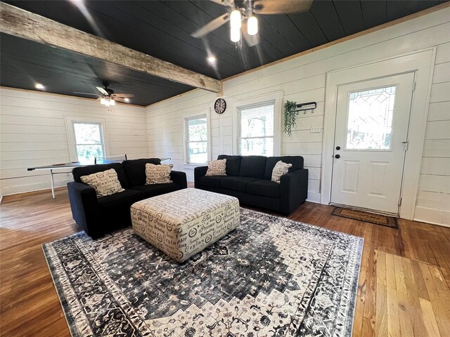 143 Lisa Layne St, Gun Barrel City, TX 75156 - living area featuring a ceiling fan, hardwood / wood-style flooring, healthy amount of natural light, wood walls, and beam ceiling