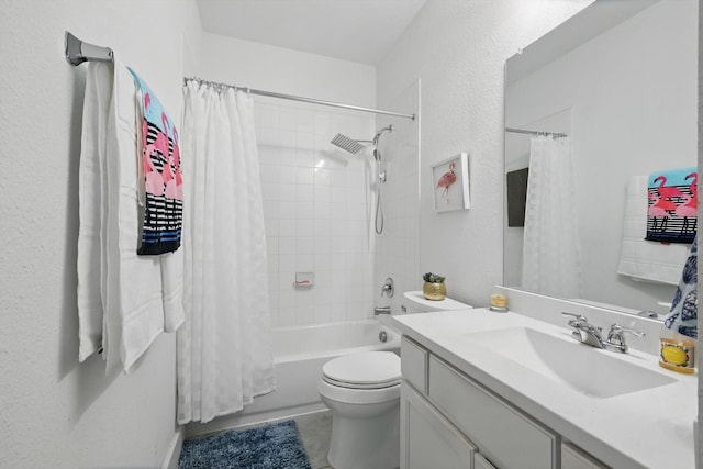 bathroom featuring shower / tub combo, vanity, tile patterned flooring, and toilet