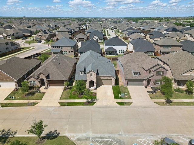drone / aerial view with a residential view