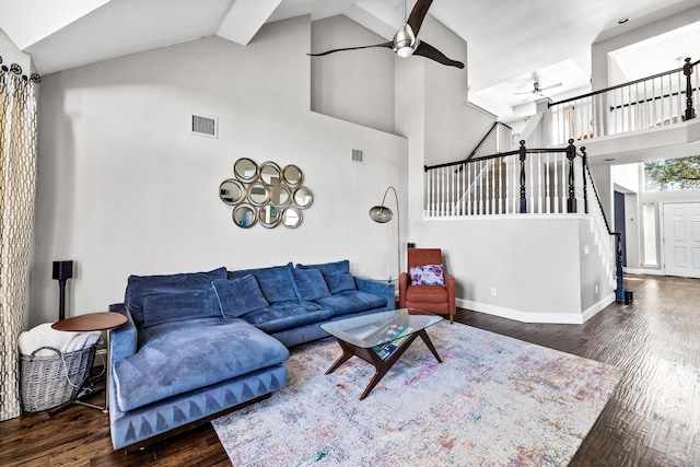 living room featuring high vaulted ceiling, visible vents, wood finished floors, and ceiling fan