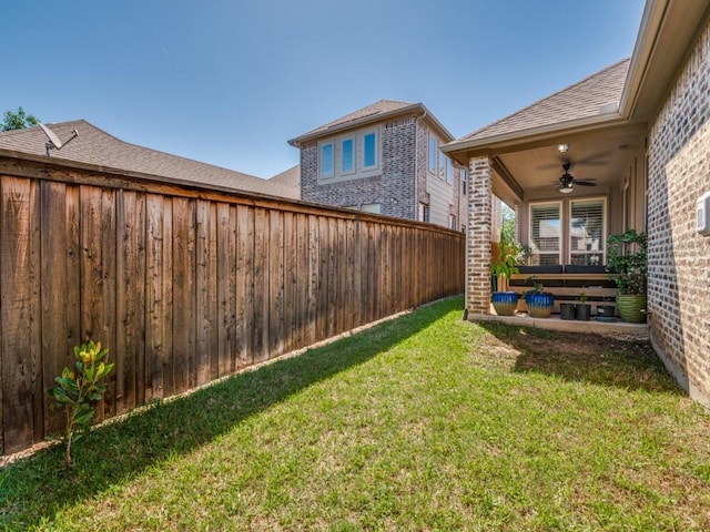 915 Enchanted Wood Dr, Arlington, TX 76005 - view of yard featuring a fenced backyard and ceiling fan