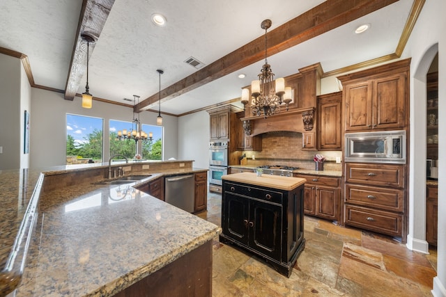 kitchen with stainless steel appliances, an inviting chandelier, a sink, beamed ceiling, and crown molding
