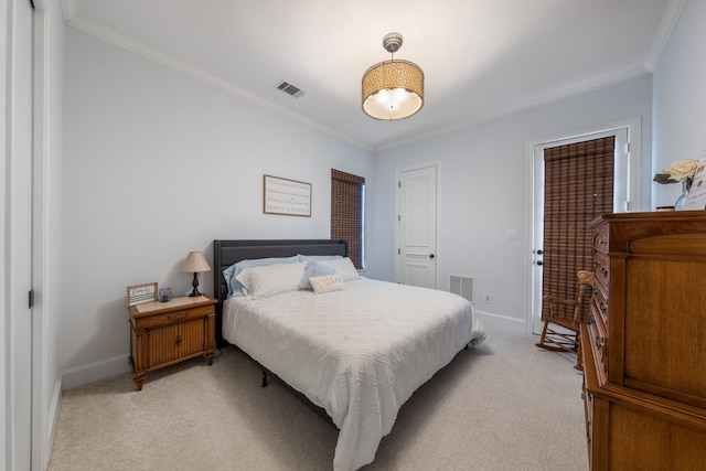 bedroom featuring visible vents, crown molding, and light colored carpet