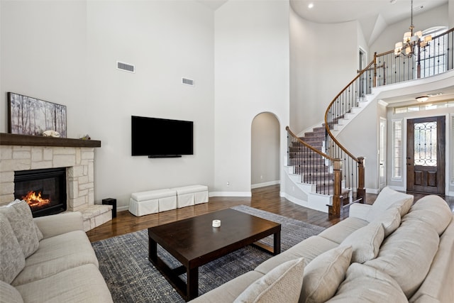 9724 Croswell St, Fort Worth, TX 76244 - living room featuring a chandelier, a high ceiling, stairway, baseboards, and wood finished floors