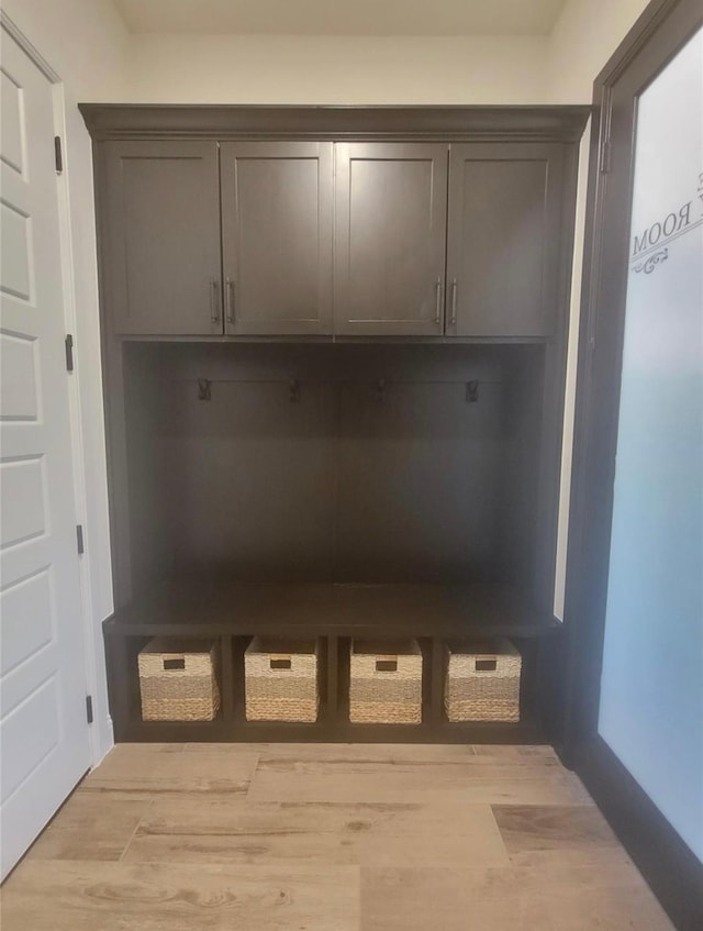 mudroom with light wood-style floors