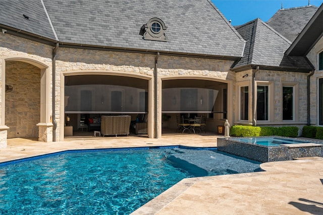 6615 Bluffview Dr, Frisco, TX 75034 - view of pool featuring a patio area and a pool with connected hot tub