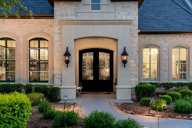 6615 Bluffview Dr, Frisco, TX 75034 - doorway to property with a high end roof and stone siding