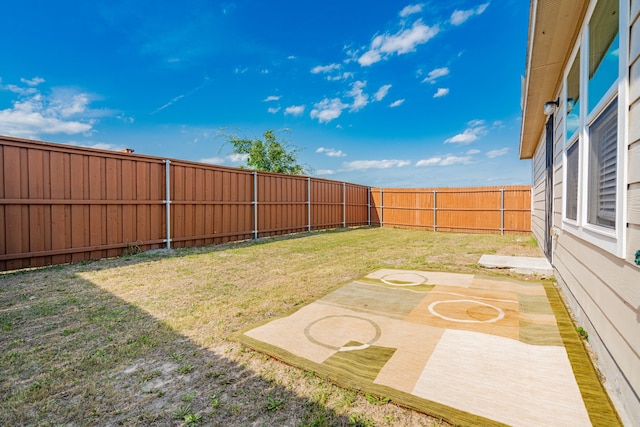 view of yard featuring a fenced backyard