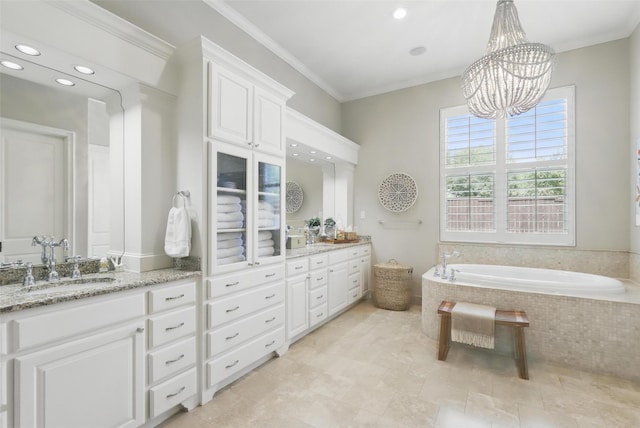 full bathroom featuring a bath, an inviting chandelier, recessed lighting, vanity, and ornamental molding