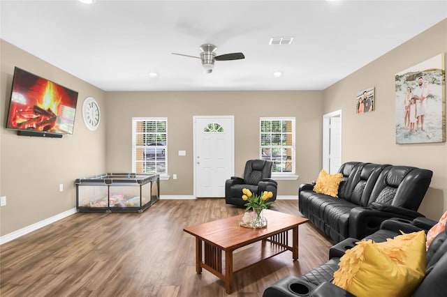 411 Johnson St, Longview, TX 75602 - living area featuring wood finished floors, a ceiling fan, recessed lighting, and baseboards