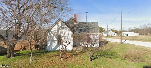 view of home's exterior featuring a lawn