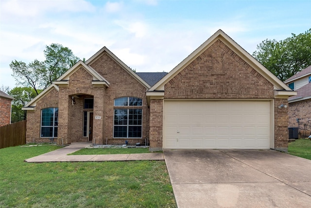 view of front of property featuring a front yard, a garage, fence, concrete driveway, and brick siding