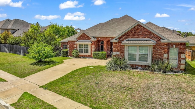 8708 Tangleridge Dr, Fort Worth, TX 76123 - view of front of property featuring brick siding and roof with shingles