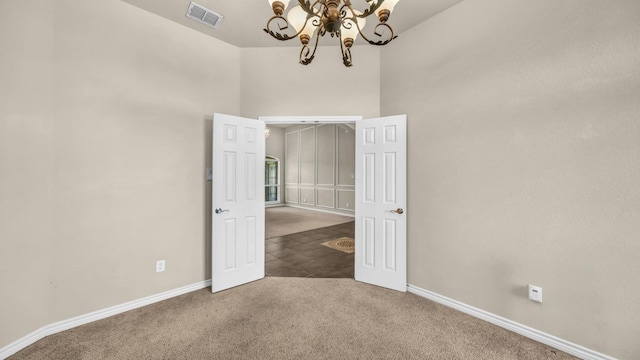 8708 Tangleridge Dr, Fort Worth, TX 76123 - empty room with a chandelier and carpet floors