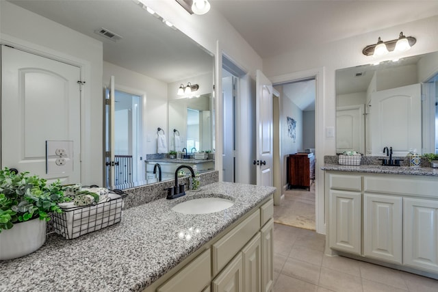 617 Denton Creek Dr, Mckinney, TX 75072 - full bath with tile patterned floors, two vanities, visible vents, and a sink