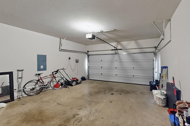 2425 Larimar Dr, Little Elm, TX 76227 - garage featuring electric panel and a garage door opener