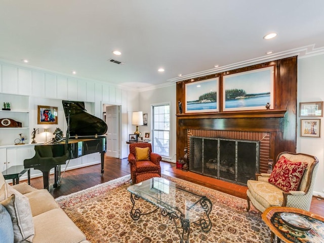 705 W Colorado Blvd, Dallas, TX 75208 - living room featuring crown molding, wood finished floors, a fireplace, and recessed lighting