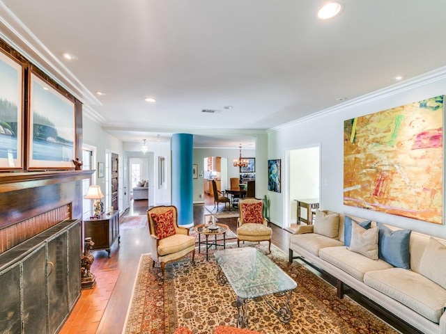 705 W Colorado Blvd, Dallas, TX 75208 - living area featuring crown molding, wood finished floors, a chandelier, recessed lighting, and a fireplace
